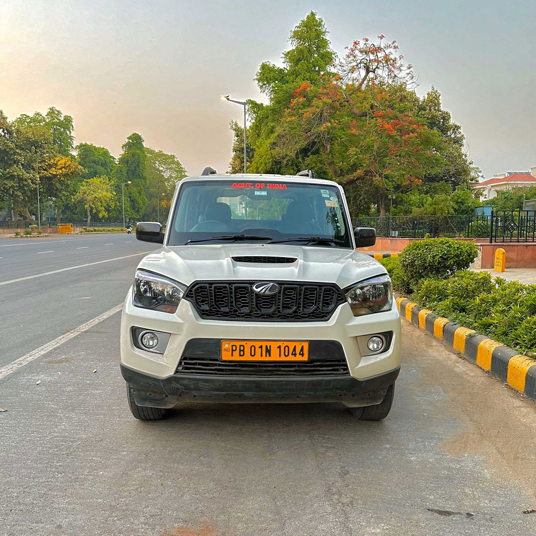 White Scorpio Car Rental